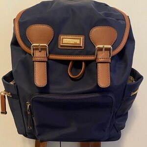 Calvin Klein Blue and Brown Backpack with Durable Fabric and Classic Design